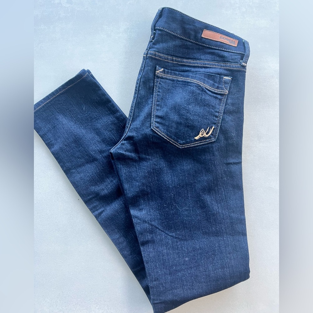 EXPRESS skinny jeans Stella blue denim size 4 regular bottoms straight leg mothe